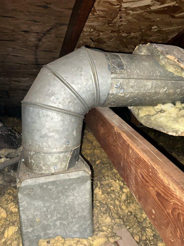 Completed comprehensive indoor air quality service including full duct system cleaning to remove accumulated dust and debris throughout the ductwork, as evidenced by heavy buildup found in spiral duct components. Performed blower wheel cleaning and indoor coil cleaning to restore system efficiency. Installed air scrubber on downflow system with mag light technology and added ductwork in attic space, utilizing 1110 or 1410 sizing as appropriate based on equipment clearances. Completed necessary duct repairs in attic area to ensure proper system sealing and performance.
