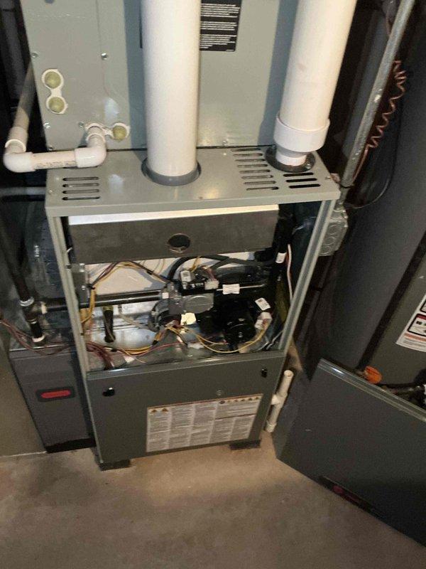Conducted comprehensive evaluation of residential HVAC system experiencing cooling performance issues. Diagnosed failed compressor requiring replacement. Assessed existing furnace, air handler, and coil assembly in basement installation. Documented equipment condition and refrigerant line configuration. Prepared estimate for complete A/C condenser and evaporator coil replacement to restore proper cooling capacity for yearly maintenance member.