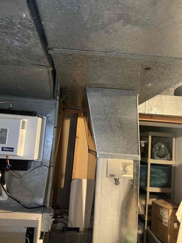 Performed comprehensive evaluation of 23-year-old residential air conditioning system and indoor coil for replacement estimate. Unit currently operational but customer seeking replacement due to age and desire to avoid further investment in aging equipment. Documented existing outdoor condensing unit and indoor evaporator coil configuration, assessed installation location against brick exterior wall with electrical disconnect, and evaluated attic-mounted air handler and ductwork system for compatibility with new equipment specifications.
