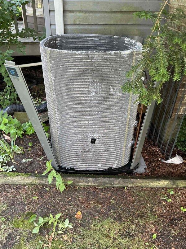 Completed comprehensive BFMA tune-up service on outdoor air conditioning condenser unit aged 4+ years. Performed standard maintenance protocol including inspection of cylindrical ribbed condenser housing, verification of unit operation, assessment of coil condition, and evaluation of overall system performance. Unit showed normal weathering consistent with outdoor exposure; all components found operational and system running within manufacturer specifications.