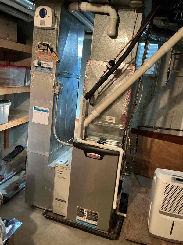 Responded to residential no cooling call with intermittent cooling operation. Upon inspection, diagnosed failing dual-run capacitor on outdoor condensing unit. Replaced defective capacitor and advised customer to power down system overnight to allow any potential ice buildup on evaporator coil to thaw completely. Verified indoor Lennox furnace and air handler components, confirmed proper ductwork connections and condensate drainage system functioning. System operational upon completion with normal cooling cycle restored.