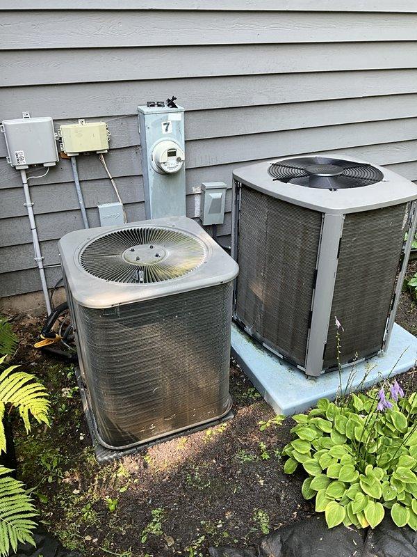 Completed comprehensive BFMA tune-up service on two outdoor air conditioning condenser units, both approximately 14 years old. Performed standard maintenance procedures including inspection of electrical components, condenser coil cleaning, refrigerant level verification, and operational testing on both systems. Replaced AprilAire air filter in the indoor air handler to ensure proper airflow and system efficiency.