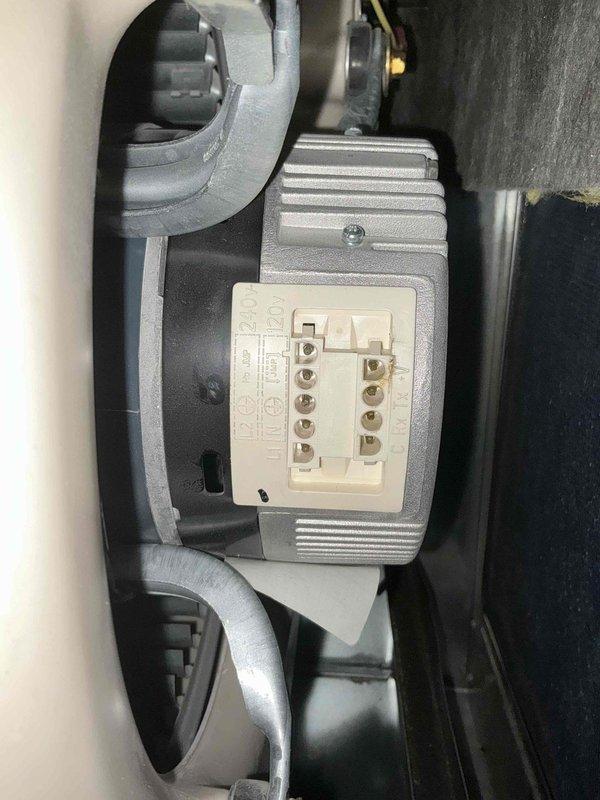 Responded to no cooling call with error codes displayed. Upon inspection, discovered failed blower motor module with damaged electrical connections at the terminal block. Removed defective motor assembly, installed replacement unit, verified all electrical connections were secure, and confirmed system restored to proper cooling operation with no error codes present.