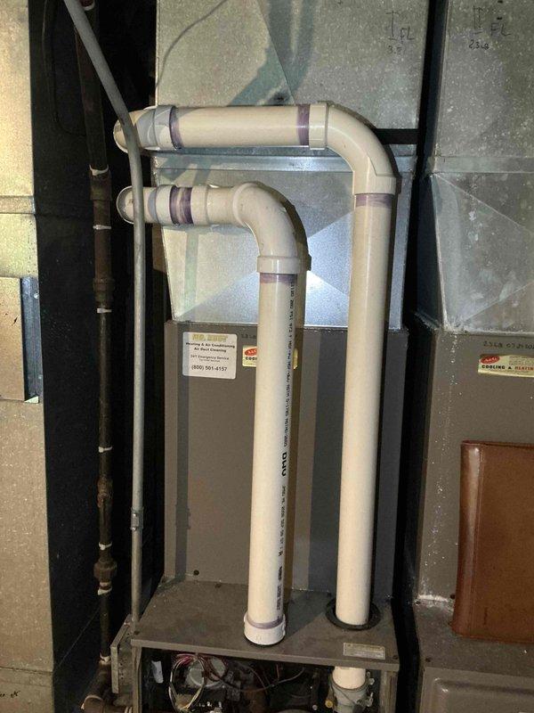 Completed comprehensive estimate for dual HVAC system replacement in residential property. Assessed existing basement installations including two York furnace and air conditioning units with current PVC venting configurations and condensate drainage systems. Evaluated ductwork, air handlers, and exhaust piping arrangements for both systems to determine replacement specifications and installation requirements for fall timeframe.