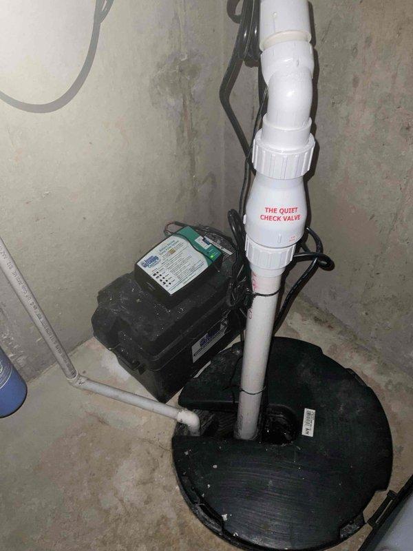 Completed comprehensive BFMA tune-up maintenance on residential HVAC system including outdoor AC condenser unit and sump pump inspection. AC unit serviced and verified operational with all components functioning properly; unit is approximately one year old and in excellent condition. Tankless water heater service was recommended for rescheduling due to missing filter required for proper inspection and maintenance completion.