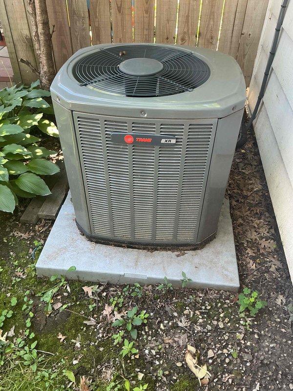 Completed comprehensive BFMA tune-up service on Trane XR series air conditioning system with equipment age exceeding two years. Performed standard maintenance protocol including inspection of outdoor condenser unit, verification of compressor operation, examination of refrigerant lines and connections, assessment of fan assembly and grille condition, and evaluation of unit mounting and surrounding clearances. All components found operating within normal parameters with no immediate service concerns identified.