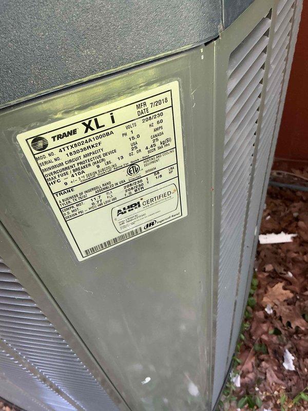 Completed comprehensive tune-up service on two Trane XL1 air conditioning systems, including a 2006 model 4TTX002A1000BA outdoor condensing unit. Performed standard maintenance protocols including inspection of electrical connections, refrigerant levels, condenser coil cleaning, fan motor operation verification, and overall system performance testing. Both units were found to be operating within manufacturer specifications, with minor vegetation growth noted around outdoor equipment that could affect airflow efficiency if left unaddressed.