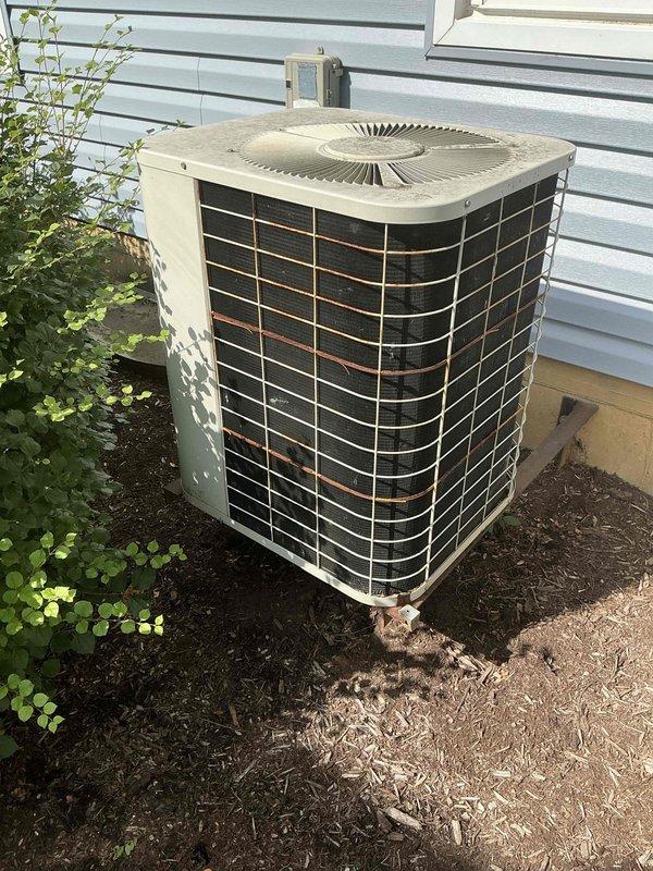 Conducted comprehensive assessment of aging residential HVAC system including outdoor condensing unit and indoor air handler with evaporator coil. System showing significant wear and approaching end of operational lifespan. Documented current equipment condition with detailed photography of both indoor and outdoor components. Provided estimate for complete air conditioning system replacement including new condensing unit and evaporator coil to restore reliable cooling capacity.