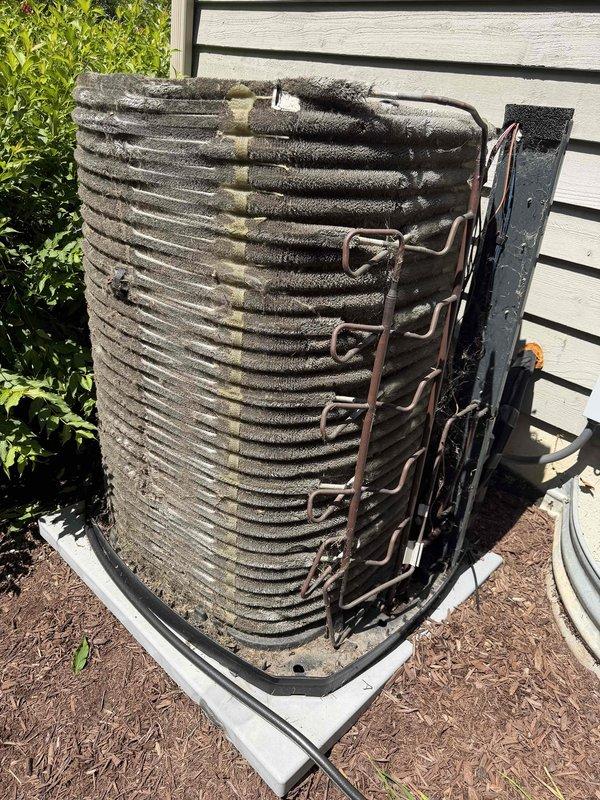 Completed comprehensive BFMA tune-up on 8-year-old air conditioning system. Performed thorough cleaning of outdoor condenser unit which exhibited heavy accumulation of dirt, dust, and debris on coil surfaces significantly restricting airflow and reducing heat exchange efficiency. Cleaned condenser coils, inspected refrigerant lines, and verified proper system operation. Inspected evaporator coil assembly showing normal condensation during cooling cycle. Changed air filter as part of semi-annual maintenance program. All components operating within normal parameters following service completion.