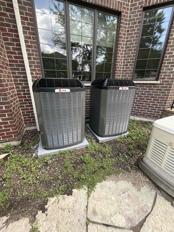 Completed comprehensive BFMA tune-up service on two Trane outdoor condensing units located at the lower level of the property. Performed full preventive maintenance protocol on both systems including inspecting electrical connections, measuring refrigerant pressures, cleaning condenser coils, checking amp draws on compressors and fan motors, verifying proper airflow, and testing system operation. Both units are approximately two years old and operating within manufacturer specifications with no deficiencies noted at time of service.