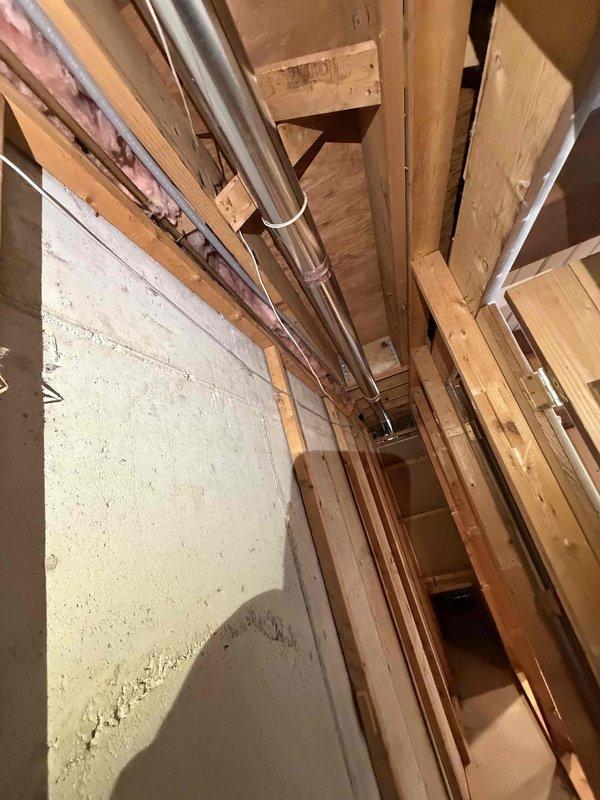 Replaced non-compliant dryer venting system with code-approved materials and proper installation methods. Removed existing deteriorated galvanized ductwork and installed new rigid metal venting with secure connections and appropriate support brackets throughout the run from the dryer location to the exterior termination point. All connections were properly sealed and the installation now meets current building code requirements for dryer exhaust systems.