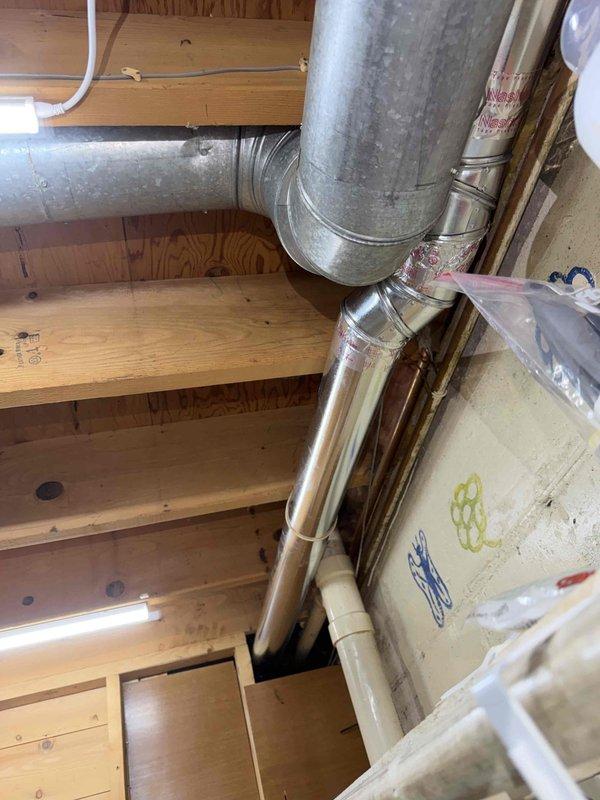Replaced non-compliant dryer venting system with code-approved materials and proper installation methods. Removed existing deteriorated galvanized ductwork and installed new rigid metal venting with secure connections and appropriate support brackets throughout the run from the dryer location to the exterior termination point. All connections were properly sealed and the installation now meets current building code requirements for dryer exhaust systems.