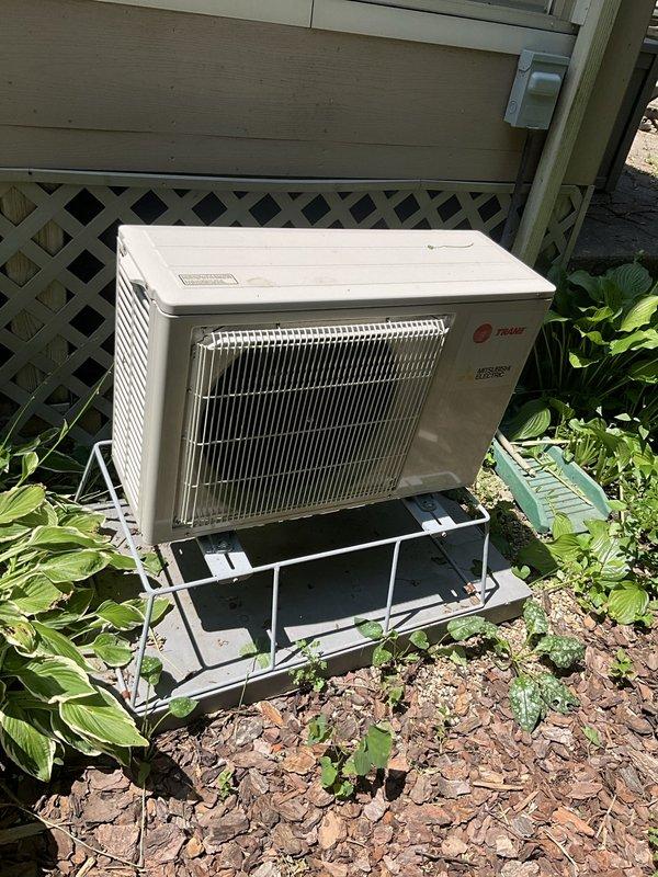 Performed comprehensive tune-up maintenance on a Trane mini-split air conditioning system. Inspected and cleaned both indoor wall-mounted evaporator unit and outdoor condenser unit, verified filters were clean and properly seated, checked refrigerant levels, tested electrical connections and components, and confirmed system operation. All equipment found to be in good working condition with no issues identified.