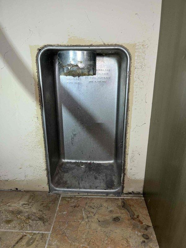 Completed dryer vent cleaning for three-system property with laundry room located on second floor, venting vertically through roof termination. Accessed dryer vent system through interior wall panel and successfully removed significant accumulation of lint, debris, and blockage material that had built up throughout the ductwork run. The substantial amount of extracted material, visible at the access point, indicated a heavily restricted airflow condition that posed both a fire hazard and efficiency concern, which has now been eliminated to restore proper venting function and safety.