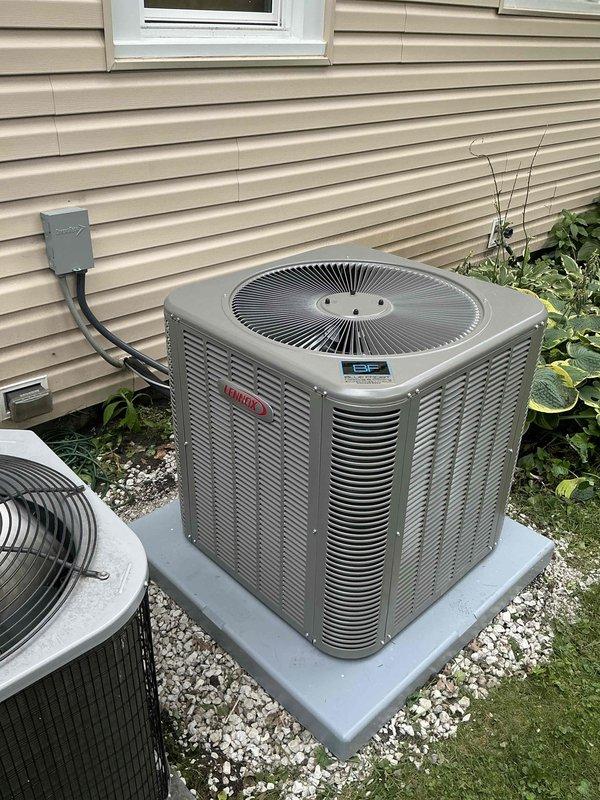 Completed full air conditioning and evaporator coil installation consisting of Lennox ML13KC1-036 outdoor condensing unit and CK40CT-30/36 indoor evaporator coil. Accessed furnace system through rear entrance and integrated new coil with existing ductwork, ensuring proper refrigerant line connections, condensate drainage via PVC piping, and electrical disconnect installation. Unit installed on concrete pad with gravel base, system tested and confirmed operational with proper airflow and cooling performance.