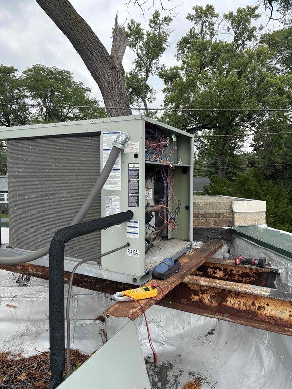 Responded to commercial no cooling call following power restoration. Upon arrival, inspected rooftop HVAC unit and found system offline after recent power outage. Tested contactor with multimeter and confirmed electrical failure preventing compressor operation. Replaced failed contactor with new component, verified all wire connections, and restored power to unit. System startup successful with proper compressor and condenser fan operation. Additionally, removed existing thermostat and installed new Ecobee smart thermostat per client request, configured WiFi connectivity for remote access capability, and provided brief operational overview. Confirmed adequate cooling output and left system running normally.