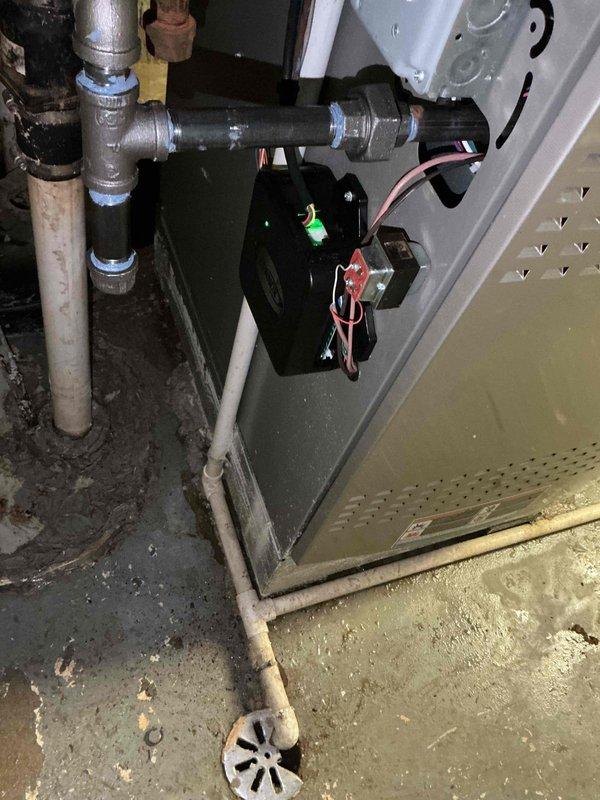 Responded to service call for furnace repair with parts staged at headquarters. Upon arrival, inspected HVAC system and identified damaged components requiring replacement on the air handler unit. Replaced faulty condensate pump assembly mounted on the front of the unit, ensuring proper electrical connections with new wiring. Addressed corroded piping and fittings in the condensate drainage system, replacing deteriorated sections to prevent future leaks. Installed new PVC drain lines and verified proper trap configuration for condensate removal. Tested all electrical connections at the junction box and confirmed proper pump operation. Cleared debris from work area and verified system functionality. All replaced components are now operating within manufacturer specifications, and condensate drainage system is functioning properly without leaks or blockages.