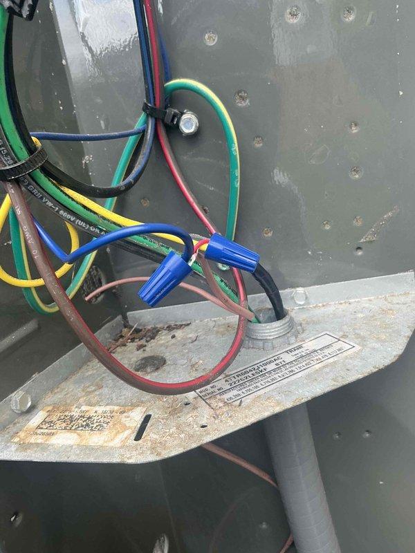 Responded to no-cool call on AC system. Upon arrival, inspected outdoor condenser unit and found contactor and capacitor connections intact with no visible signs of failure. Documented electrical component configuration including contactor relay and cylindrical run capacitor with wiring connections. Advised customer to keep unit off until issue could be properly diagnosed and instructed customer to provide advance notice for return visit to complete troubleshooting and repairs.