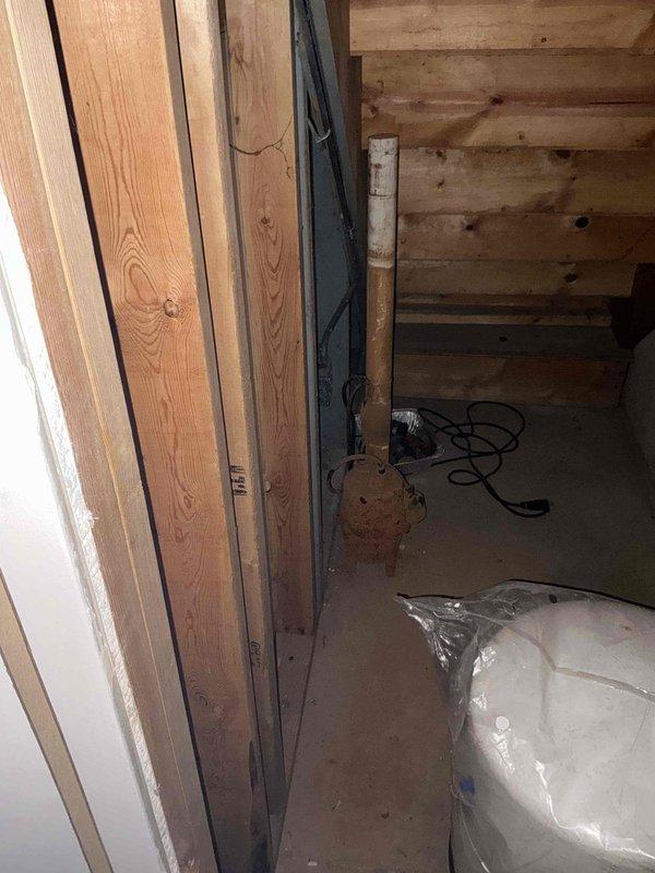 Completed comprehensive sump pump inspection per client's request for morning service appointment. Inspected sump basin interior condition, noting age-related wear and discoloration on walls, verified pump functionality and discharge system components, and documented all mechanical equipment and mounting hardware. System operational with no immediate repairs required at time of inspection.