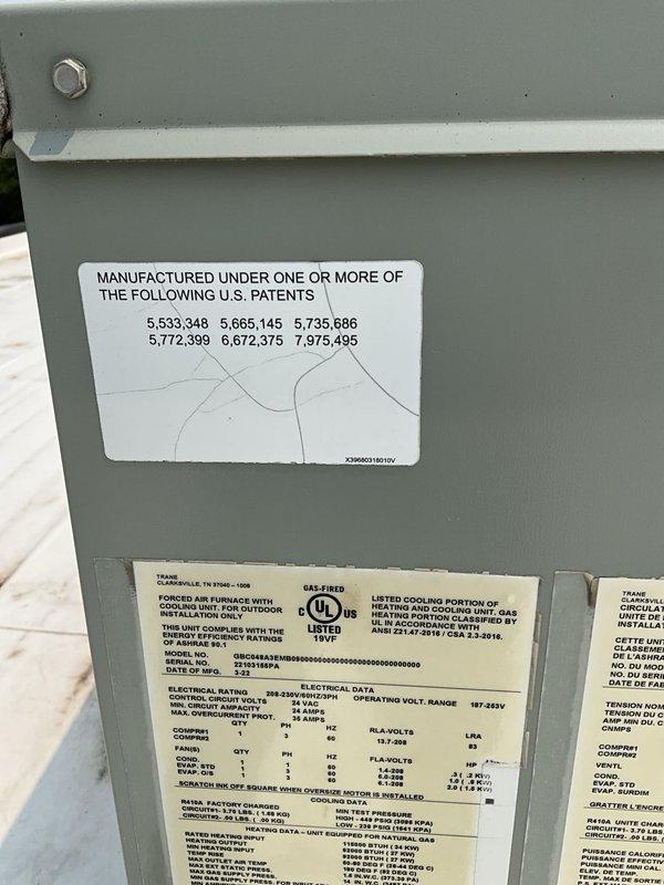 Responded to commercial no cooling call on rooftop unit installed four years ago. Upon arrival, inspected RTU and verified system operation. Unit found to be functioning properly at time of service visit with thermostat displaying 74°F and equipment operating within normal parameters. Documented equipment nameplate information and current thermostat settings. Provided consultation regarding replacement estimates for additional aging rooftop units on property as requested.