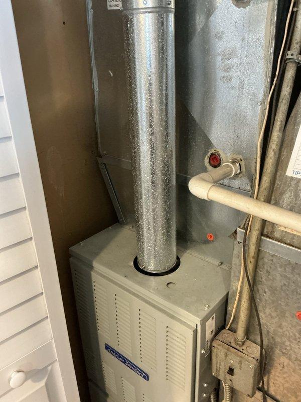 Completed comprehensive assessment of existing HVAC system including 18-year-old American Standard furnace and 16-year-old air conditioning unit located in basement utility area. System currently operational but exhibiting underlying performance issues prompting evaluation for full replacement options. Documented existing equipment installation, ductwork configuration, gas line connections, electrical components, and overall system condition through photographic records. Prepared detailed replacement proposal with equipment sizing recommendations tailored to home's specific heating and cooling requirements.