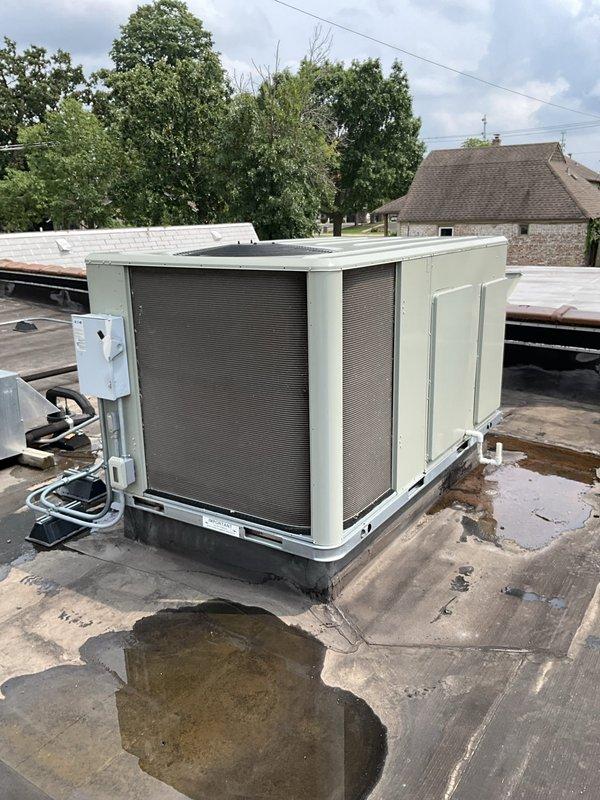 Responded to commercial HVAC service call for rooftop unit filter replacement. Upon arrival, accessed Trane RTU located on flat membrane roof and performed scheduled filter change-out using parts previously staged at headquarters. Completed filter replacement per manufacturer specifications. Unit operational at time of departure. Noted standing water and drainage concerns on roof surface surrounding equipment during service visit.