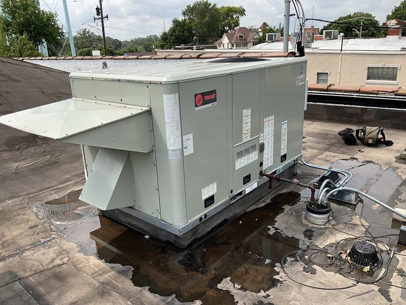 Responded to commercial HVAC service call for rooftop unit filter replacement. Upon arrival, accessed Trane RTU located on flat membrane roof and performed scheduled filter change-out using parts previously staged at headquarters. Completed filter replacement per manufacturer specifications. Unit operational at time of departure. Noted standing water and drainage concerns on roof surface surrounding equipment during service visit.