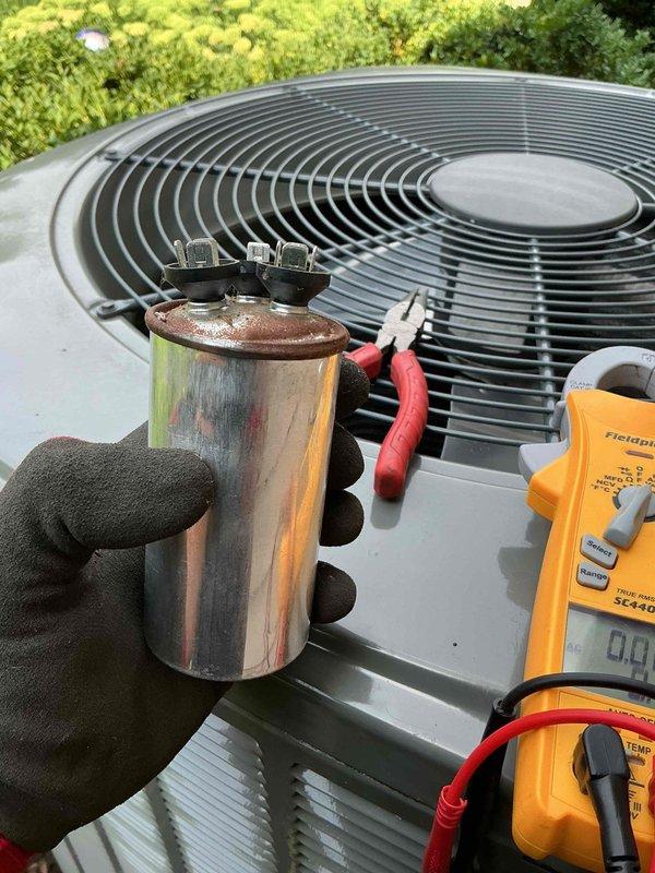 Responded to no cool call on two-year-old air conditioning system experiencing significantly reduced cooling capacity. Upon inspection, tested outdoor unit capacitor with digital multimeter and found failed component preventing compressor from operating at full capacity. Replaced defective capacitor with properly rated unit, verified electrical connections, and confirmed system returned to normal cooling operation.
