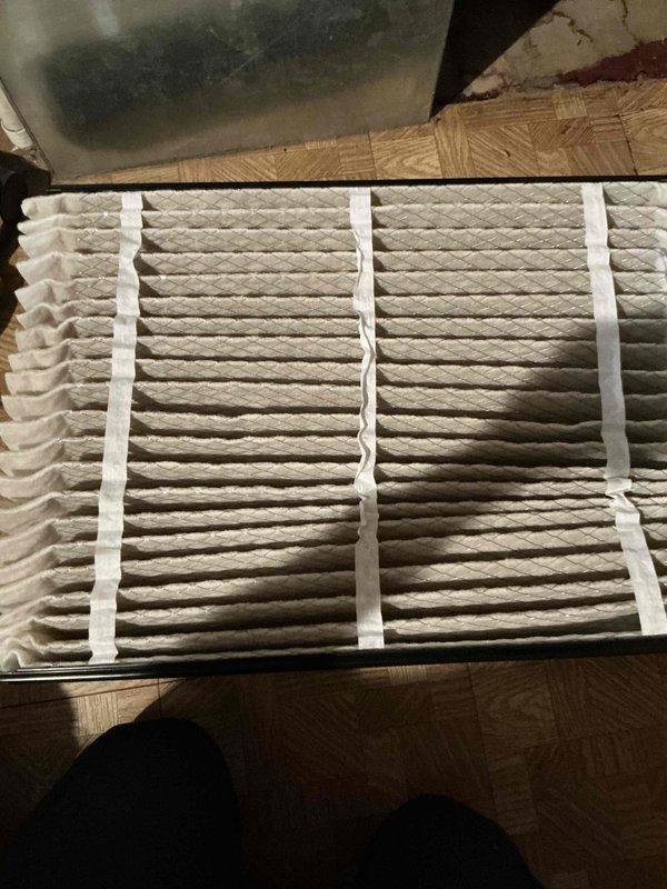 Completed comprehensive AC tune-up for monthly plan member during scheduled afternoon appointment. Performed full system inspection of outdoor condenser unit and indoor components, noting visible dirt and debris accumulation on condenser coils and exterior grill. Inspected air filter showing normal dust accumulation from use, verified system operating within proper parameters with no immediate service needs identified.