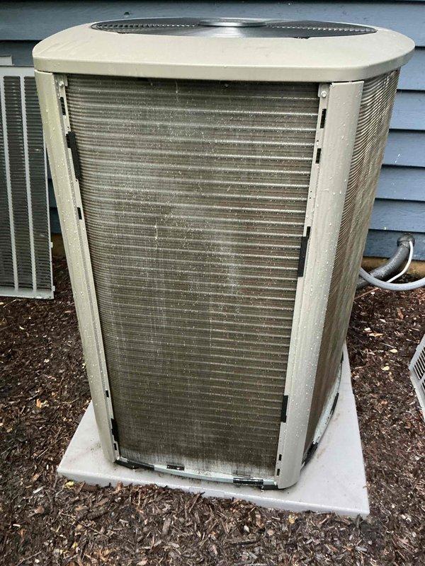 Completed comprehensive BFMA tune-up on outdoor air conditioning condenser unit installed in August of previous year. Performed standard maintenance protocol including inspection of all components, cleaning of condenser coils which showed significant accumulation of dirt and debris on aluminum fins, verification of refrigerant levels, electrical connections check, and operational testing. Unit returned to optimal performance specifications with improved airflow efficiency following coil cleaning and system evaluation.