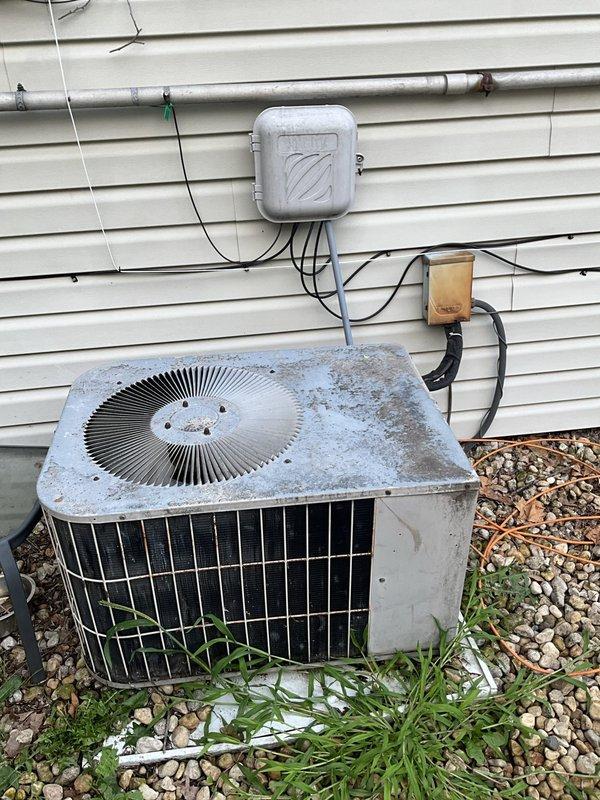 Responded to no cooling call on residential property. Upon arrival, found outdoor condensing unit in non-operational state. Unit appears to be original equipment from the 1990s showing significant age-related wear, weathering, and exterior deterioration. Performed visual inspection of condensing unit exterior and electrical connections. Conducted internal ductwork inspection using camera equipment to assess system condition. Documented equipment condition and findings with photographic evidence. Communicated with homeowner regarding unit status and inspection results.