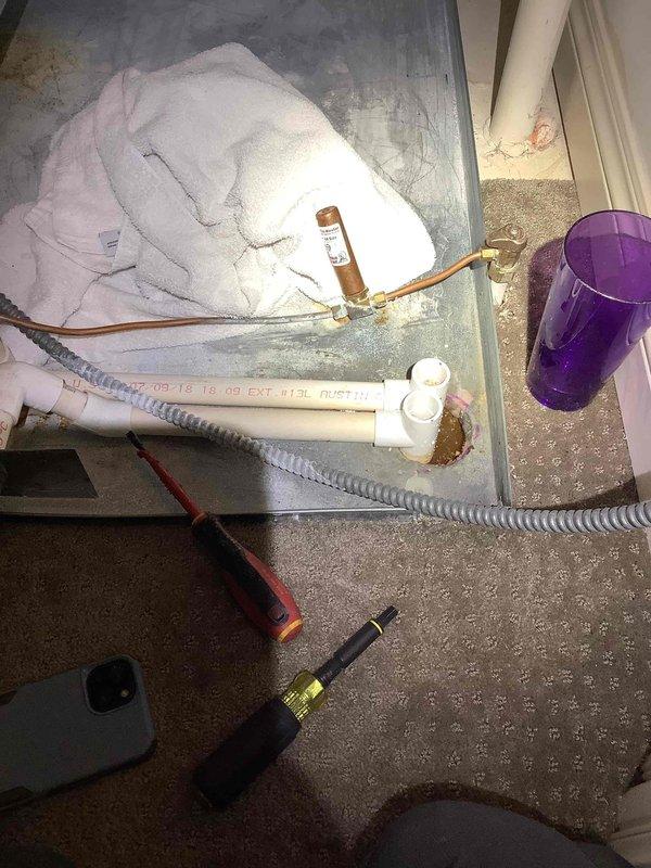 Responded to service call for furnace water leak causing property damage. Upon arrival, found condensate drainage system failure resulting in overflow that filled drain pan and caused wall damage. Inspected HVAC system including furnace unit, condensate pump, and associated drainage lines. Cleared blocked condensate line, verified proper drainage flow, and tested condensate pump operation to ensure system functionality. Repaired copper refrigerant lines and PVC condensate piping connections to prevent future leakage. System restored to normal operation with all drainage components functioning properly.