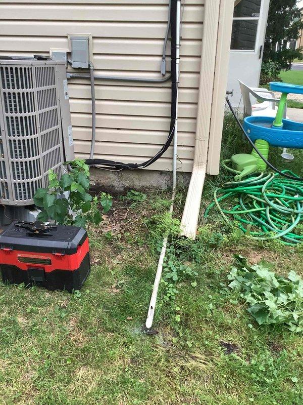 Responded to service call for air conditioning system repeatedly tripping circuit breaker and unable to operate. Upon inspection, discovered condensate drain pan had excessive water accumulation triggering the safety float switch, which was preventing system operation as designed. Cleared blockage in condensate drain line, verified proper drainage, tested float switch functionality, and confirmed system restored to normal operation without tripping breaker. Unit cooling properly upon departure.
