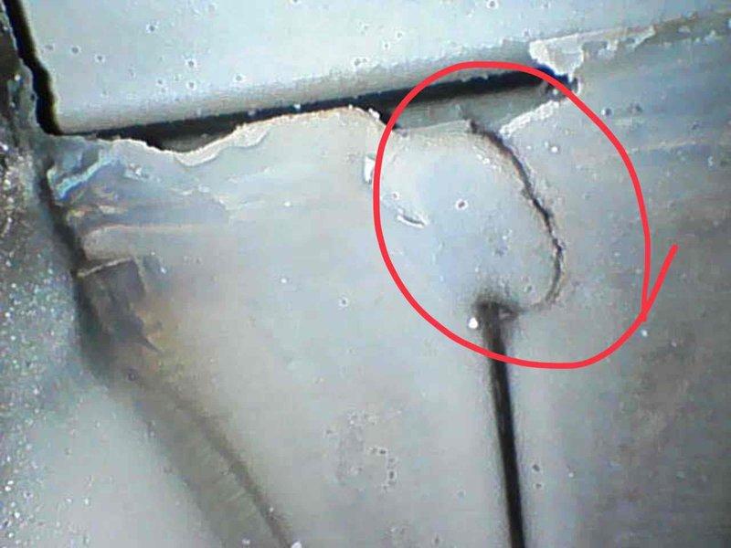 Performed diagnostic on commercial HVAC system with multiple rooftop units. Identified gas leak on indoor unit serving west side equipment and documented with photos showing concrete penetration point and affected piping. Completed initial diagnostics on east unit and documented control wiring and safety labels on mechanical components. Due to time constraints and complexity of findings, attached tech return tag for follow-up visit to confirm east unit diagnosis with technical support and complete comprehensive diagnostic on west side unit gas leak issue.