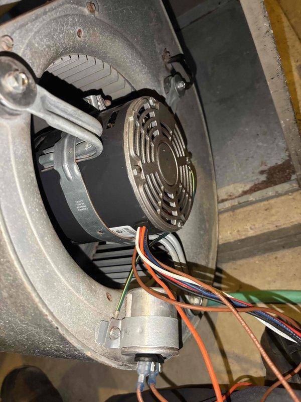 Responded to service call for noise complaints on two 20-year-old air conditioning systems. Upon inspection, discovered significant dust and debris accumulation on blower wheel assembly, which was causing operational noise. Accessed blower motor compartment and documented condition of squirrel cage fan showing heavy buildup on blades and housing. Inspected blower motor assembly, electrical connections, capacitor, and mounting hardware. Both systems exhibited normal wear consistent with age and lack of regular maintenance. Recommended thorough cleaning of blower components and routine preventive maintenance to restore quiet operation and maintain system efficiency.