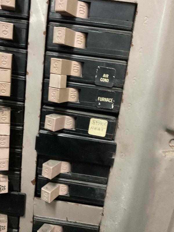 Responded to service call for non-operational commercial rooftop unit. Upon arrival, inspected electrical panel and discovered tripped breakers for air conditioning and furnace circuits. Reset breakers, verified proper operation of RTU, and confirmed system returned to normal function with adequate cooling output.