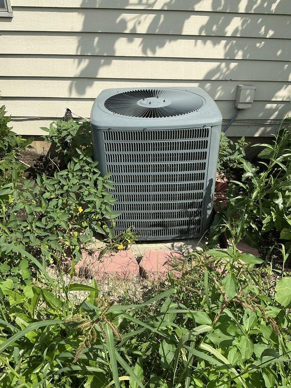 Completed sales estimate for furnace replacement at residential property. Assessed existing HVAC system in basement mechanical room, including vertical air handler unit and outdoor condenser unit, both showing signs of age and wear. Documented current equipment specifications and condition, photographed installation for proposal preparation, and identified heating system issues requiring replacement to ensure reliable operation and home comfort.