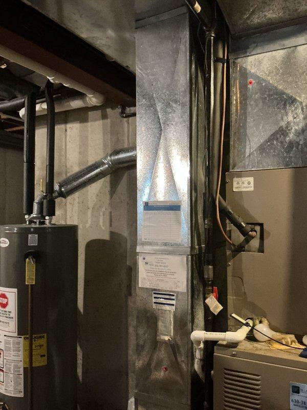 Completed sales estimate for furnace replacement at residential property. Assessed existing HVAC system in basement mechanical room, including vertical air handler unit and outdoor condenser unit, both showing signs of age and wear. Documented current equipment specifications and condition, photographed installation for proposal preparation, and identified heating system issues requiring replacement to ensure reliable operation and home comfort.
