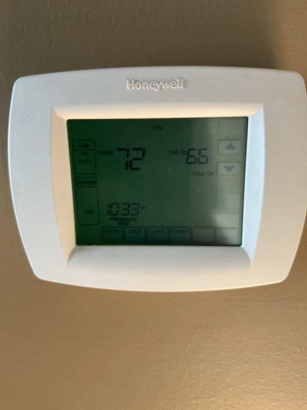Completed comprehensive BFMA tune-up service on 13+ year old air conditioning system, including inspection of blower motor assembly, electrical connections, and ductwork components. Verified proper operation of Honeywell digital thermostat with current temperature reading of 72°F and setpoint of 66°F. All system components inspected and confirmed operational with no immediate repairs required.