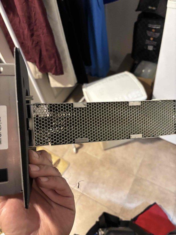 Replaced UV bulb assembly in HVAC system as part of scheduled maintenance. Removed existing UV light component showing dust accumulation on heat exchanger fins and honeycomb mesh filter, installed new bulb unit, and verified proper operation of system upon completion.