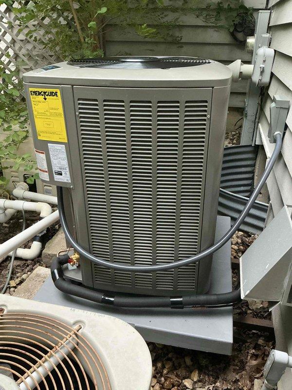 Completed full HVAC system replacement installing Lennox EL297 high-efficiency furnace rated at 135,000 BTUs and 97% AFUE, paired with Lennox EL15 air conditioning unit rated at 15 SEER2. Installed Lennox S40 smart thermostat for system control and integrated Aprilaire 1210 whole-home humidifier with powered operation as part of premium installation package. Reused existing refrigerant lineset, return air drop, and furnace venting to minimize installation modifications. Installed Siemens 50A2P circuit breaker for electrical service to outdoor condenser unit. Mounted indoor furnace unit in basement mechanical room with proper clearances and connected refrigerant lines to outdoor condenser positioned on exterior platform. Verified all electrical connections, tested system operation across heating and cooling modes, and confirmed proper airflow and temperature differentials. System commissioned and left in full operational status.