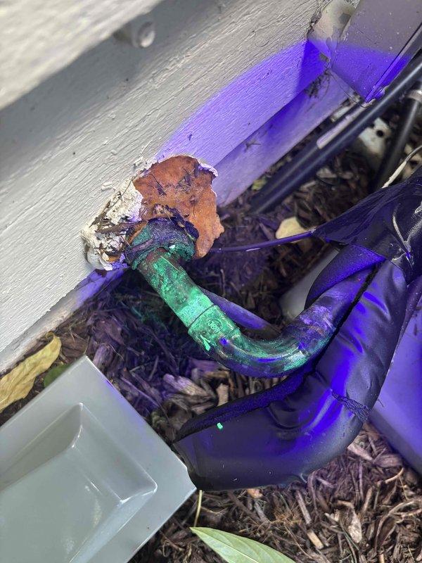 Responded to emergency call for air conditioning unit making unusual noises. Upon inspection, discovered severe corrosion and deterioration on refrigerant line set and associated copper piping installed approximately six months prior. Documented extensive oxidation, rust damage, and compromised connections requiring immediate attention to prevent system failure and refrigerant loss.