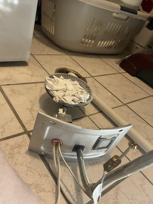 Responded to no hot water complaint at 26-year-old residence. Upon inspection, diagnosed failed heating element in tanked water heater. Removed and replaced defective heating element assembly. Tested unit operation, verified proper ignition sequence, and confirmed restoration of hot water supply throughout home. System returned to normal operating condition.
