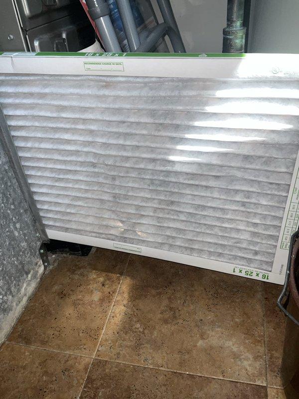 Completed comprehensive BFMA tune-up on 5-year-old residential air conditioning system during afternoon service window. Performed complete system inspection of outdoor condenser unit, verified proper operation of all components, checked electrical connections at disconnect box, and inspected refrigerant lines. Evaluated and documented condition of 16x25x1 air filter showing dust accumulation, assessed indoor HVAC equipment and ductwork connections, confirmed system airflow and operational parameters within manufacturer specifications.