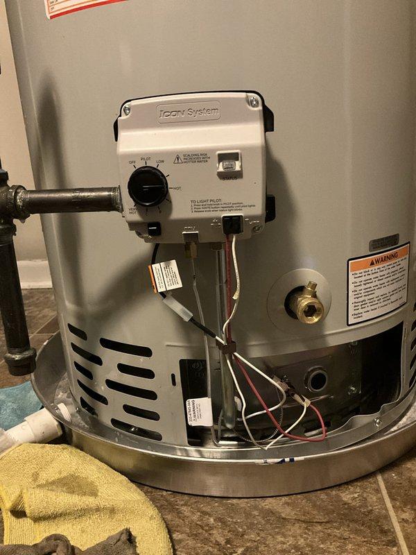 Responded to gas leak call at water heater with reported strong odor. Inspected gas control valve assembly and connections on water heater unit. Advised client to contact Nicor Gas for official leak detection and tagging service to identify exact source of gas leak, as utility company involvement is required for proper documentation and safety protocol compliance.