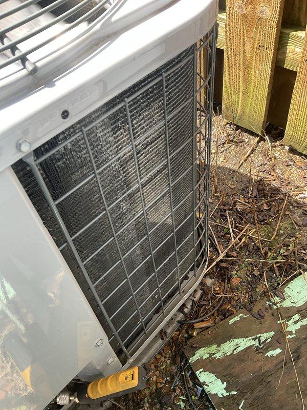 Completed comprehensive BFMA air conditioning tune-up on outdoor condenser unit, including system diagnostics, performance testing, and operational assessment. Unit exterior showed significant debris accumulation on protective grille and condenser coils; performed thorough cleaning and inspection to ensure proper airflow and heat exchange efficiency. All system parameters measured and verified within manufacturer specifications using calibrated diagnostic equipment.