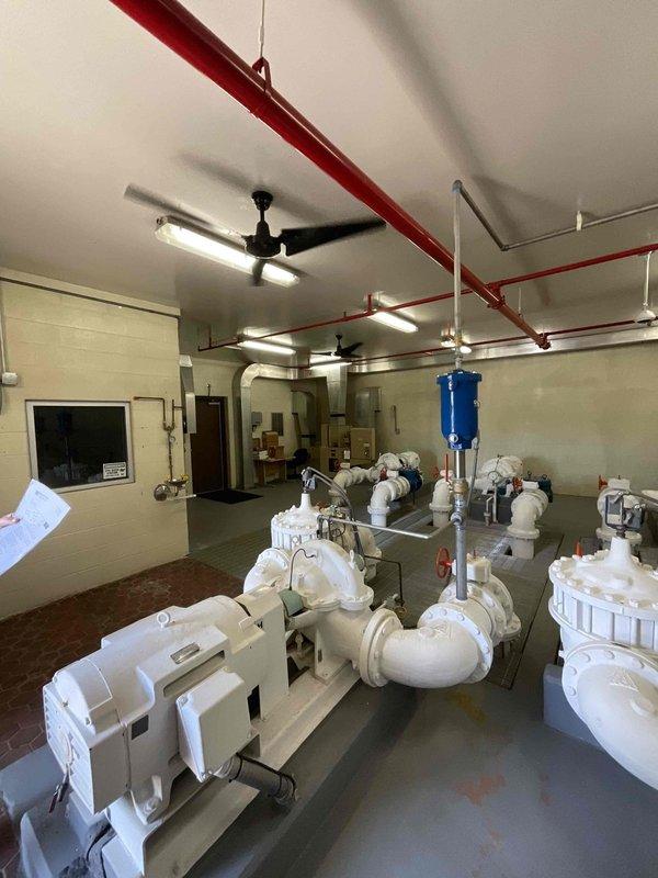 Conducted site assessment for commercial dehumidification system installation in mechanical room housing multiple industrial pumps and existing HVAC equipment. Documented existing conditions including exposed infrastructure, ductwork configuration, and available space for equipment placement, and provided estimate for commercial-grade dehumidifier to address indoor air quality concerns.