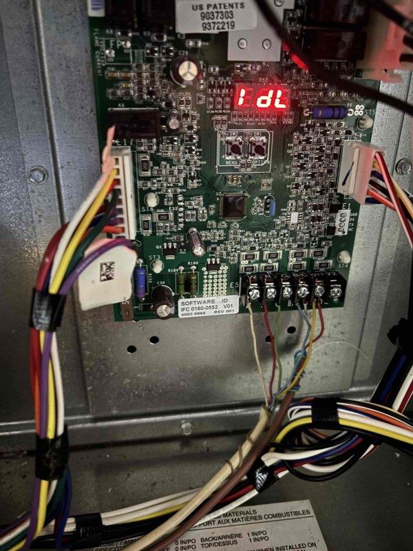 Responded to no cooling complaint at residential property. Upon arrival, found system control board displaying "Fdl" fault code indicating a flame detection lockout error. Thermostat was calling for cooling at 73°F setpoint but system was unable to operate due to control board fault. Diagnosed failed control board as root cause of no cooling condition. Replaced defective control board, restored system operation, and verified proper cooling cycle. System now operating within normal parameters.