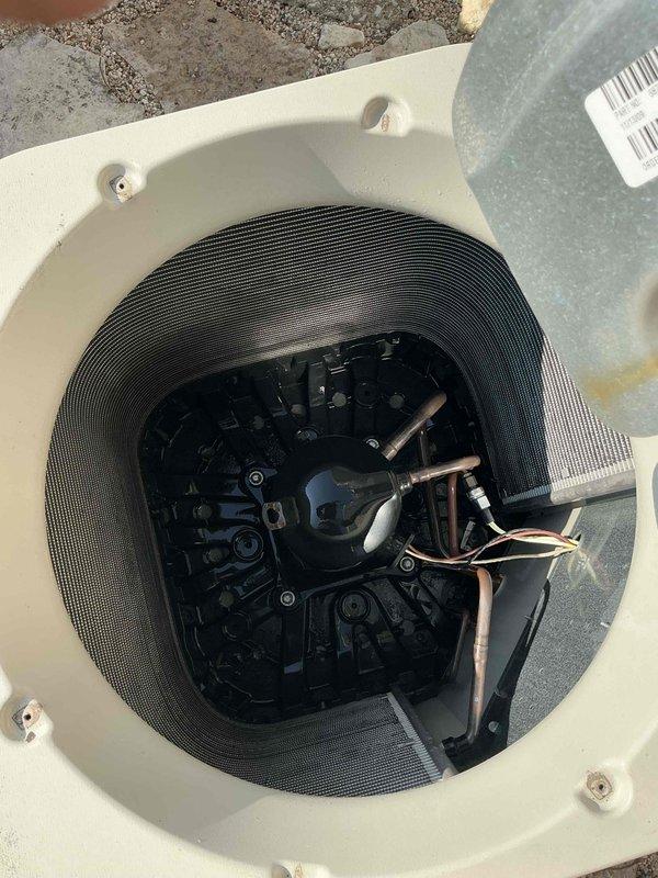 Completed comprehensive BFMA tune-up maintenance on air conditioning system over 4 years old. Performed thorough inspection of electrical components including capacitor, contactor, and starting relay kit with all wiring connections verified secure and properly terminated. Inspected compressor unit and refrigerant lines for proper operation, checked all mounting hardware and mechanical components for secure installation, and documented system condition with detailed photographs of internal control panel and exterior unit components.