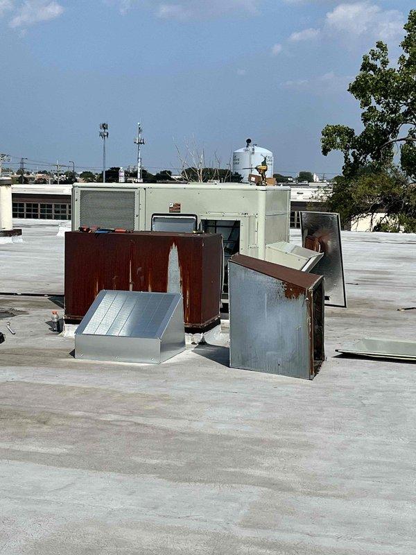 Completed full replacement of two commercial rooftop units on a commercial building. RTU1, a 30-year-old unit operating on discontinued refrigerant, and RTU2, a 20-year-old unit requiring extensive repairs, were removed and replaced with new equipment. Crane services were utilized on the west side of the building to safely lift and position the new units onto the rooftop, with all equipment suppliers and scrap removal services coordinated for efficient project completion.
